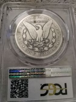 Graded 1899 cc Morgan Silver dollar