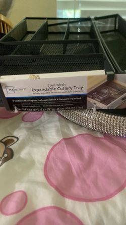 Steel mesh expandable cutlery tray it’s in good condition never used.