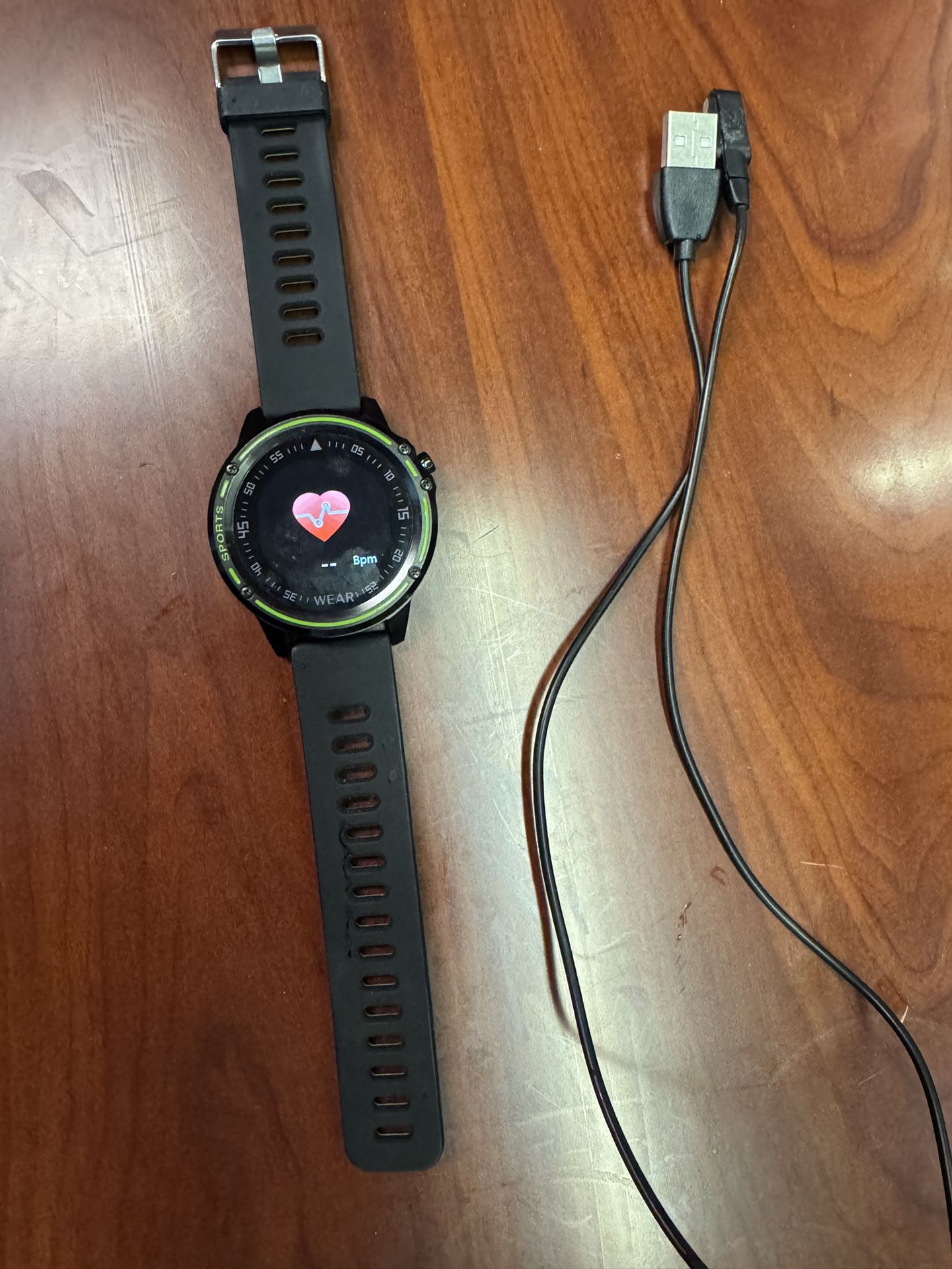 Smart Watch And Magnetic Charging Cable.