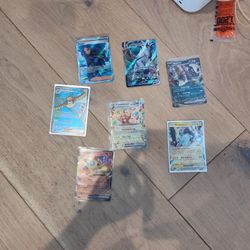 7 Pokemon Cards 