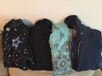 4 ladies Medium Light weight jackets in good used condition. Smoke free home