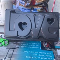 Wilson brand cake dish for says LOVE