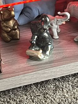 Elephant With Tree Branch 