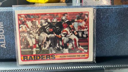 1989 Topps football card featuring Marcus Allen of the Los Angeles Raiders, specifically card #264 titled "Allen Through the Line"