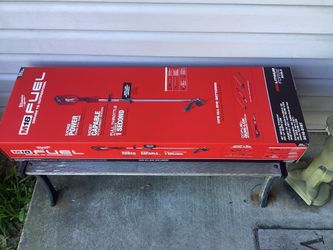 Milwaukee M18 FUEL  String Trimmer Kit w/QUIK-LOK .  Includes Rapid Charger And  8.0 FORGE Battery.  Brand NEW.
