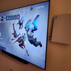 85 Inch Samsung 4K TV & Playstation 5 with The RoomPlace furniture for sale. 