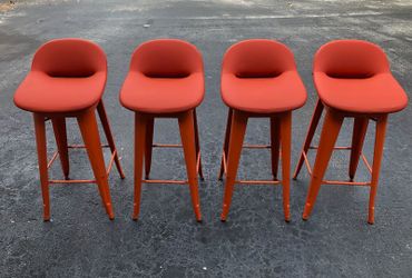 Set of 4 Orange Metal Bar Stools with Cushioned Seats