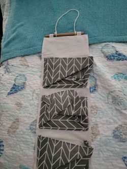 Brand new gray three pockets hang up organizer