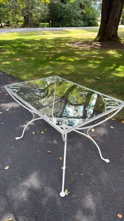 Vintage Salterini garden table with glass top.