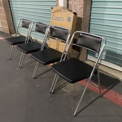 Vintage Cosco Chrome and Black Vinyl Folding Chairs