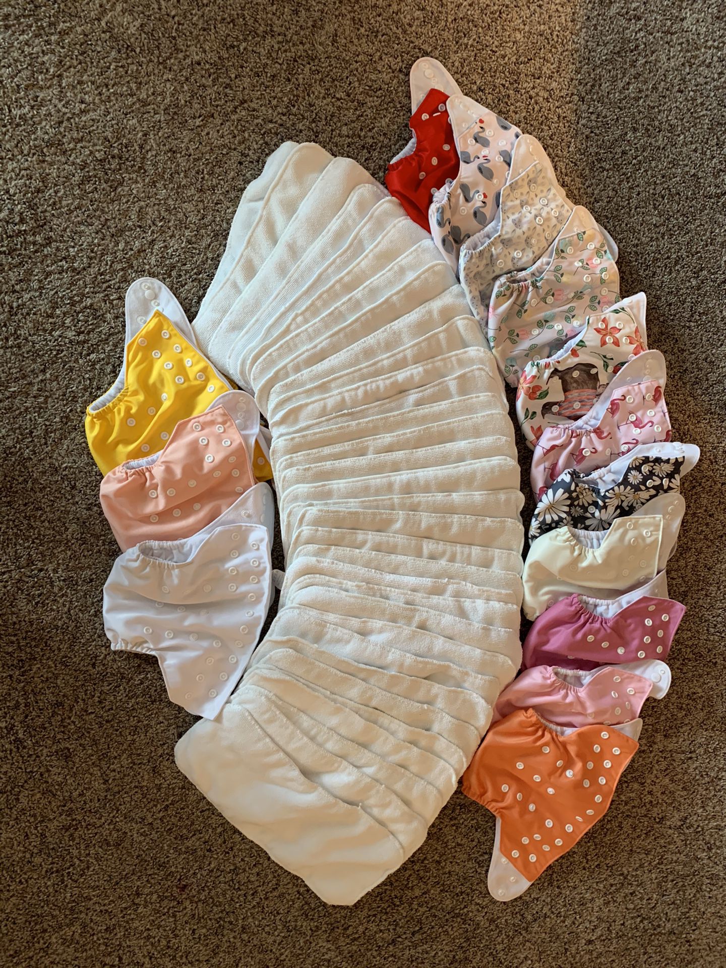 14 cloth diapers, 32 microfiber liners, diaper sprayer