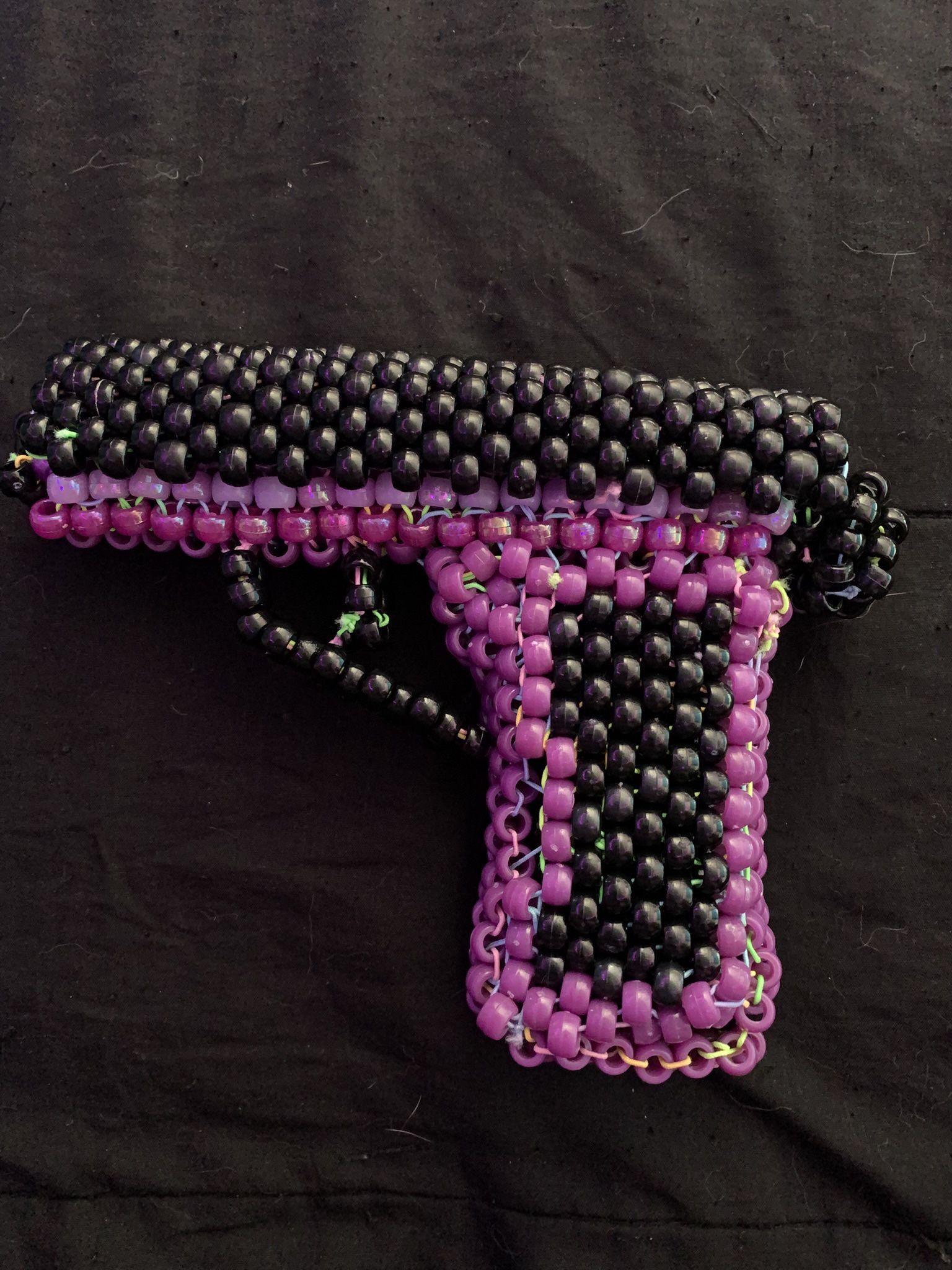 Posable purple and Black Raver Kandi Gun 