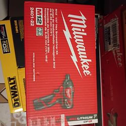 Milwaukee M12 Hex Screwdriver Drill .2 Batteries 1.5ah . Charger.