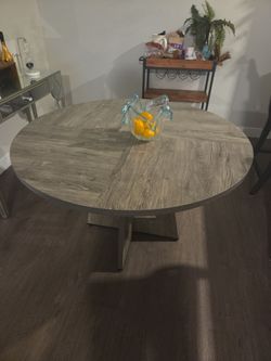 Table $100