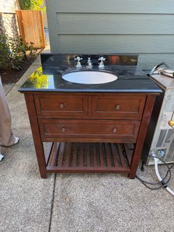 Bathroom Vanity with Black Granite Top and Sink