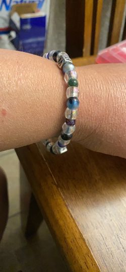 Homemade elastic bracelet with some glass beads