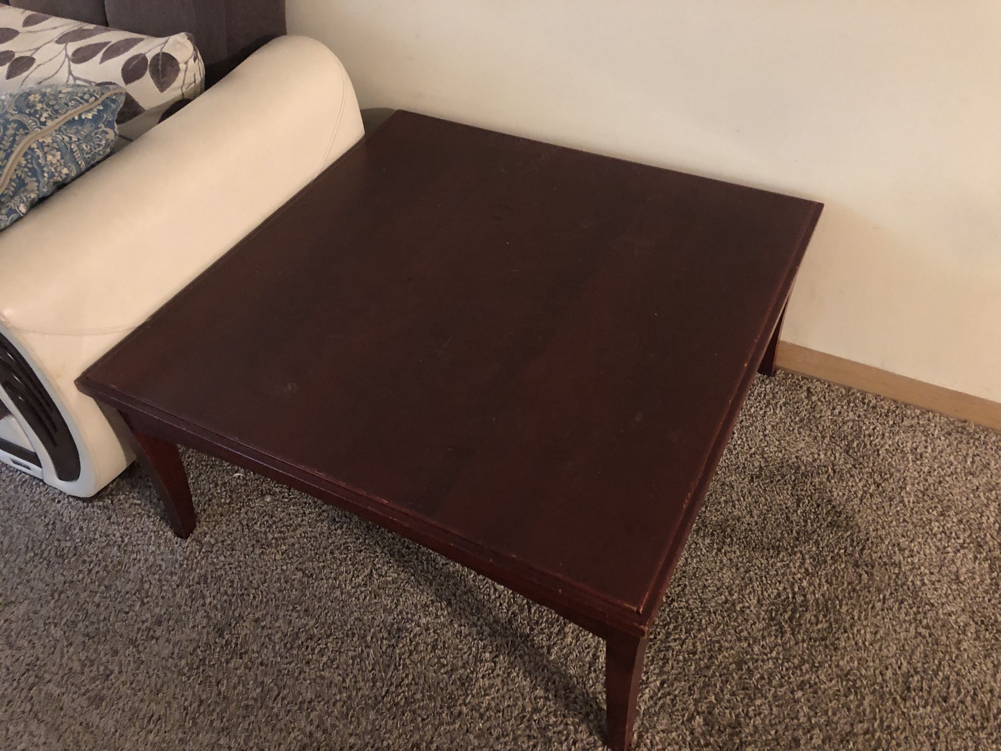 3 Couch Set And A Wooden Table