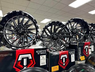 NEW TIS WHEELS AND TIRES