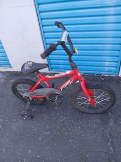 Huffy 16" bike with training wheels.