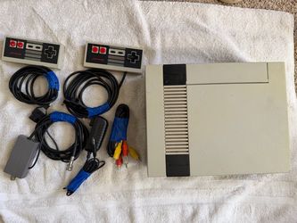 Original 1985 Nintendo with 2 controllers and 6 games