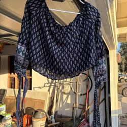 Navy off-shoulder top with patterned tie sleeves