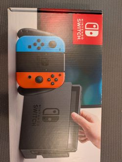 Nintendo switch + 2 Super Mario Games
