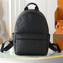 Louis Vuitton Black Embossed Backpack – Sleek LV Bag