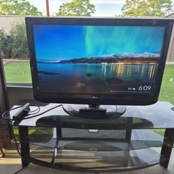 42" LG With Remote And Glass Stand