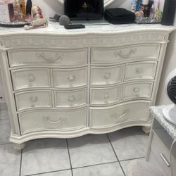 dresser and mirror (doesn’t include what’s ontop of dresser only includes mirror)