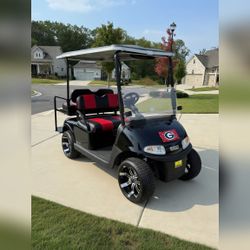 EZ-GO RXV Golf Cart Black with Red Seats - Like New – Flowery Branch, GA