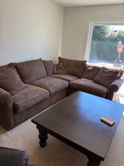 Large coffee table by couch