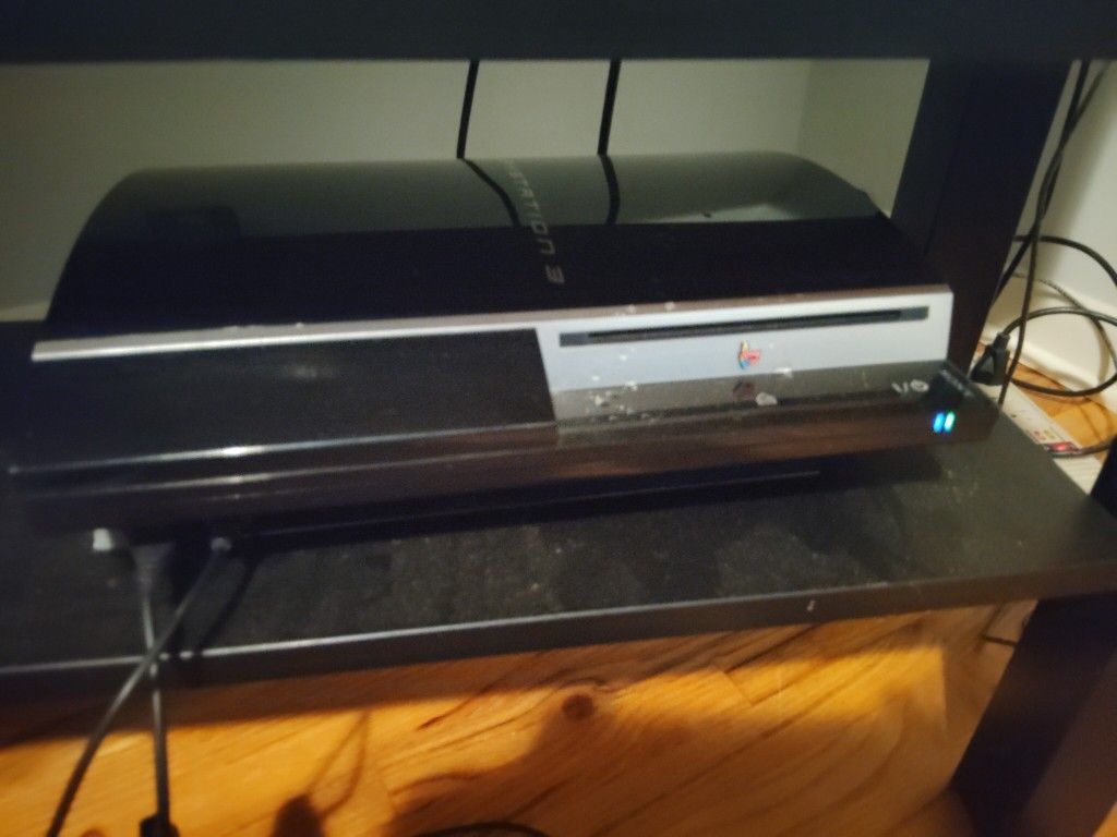 PS3 With WirelessGuitar, Dongle, Three Wireless Controllers, And Games