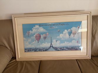 Ballooning Over Paris 1890 Framed Print