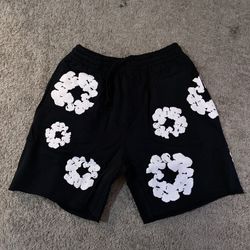 black denim tear shorts