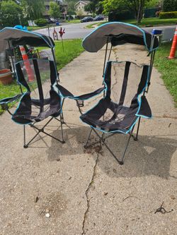 Price is firm.. two folding camping chairs with pop-up canopies