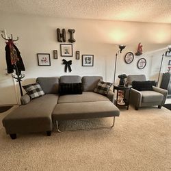 Dark gray couch with lounge chair