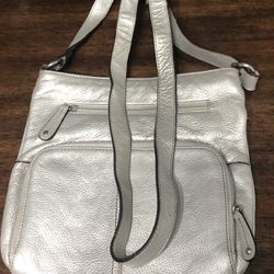 Tignanello  Genuine Leather Silver crossbody bag with zip  multi  functional pockets.