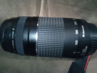 Canon E.S.O. Rebel 17 only been used once you've seen the pictures how much it retails for comes with extra high-dollar lens selling for $600