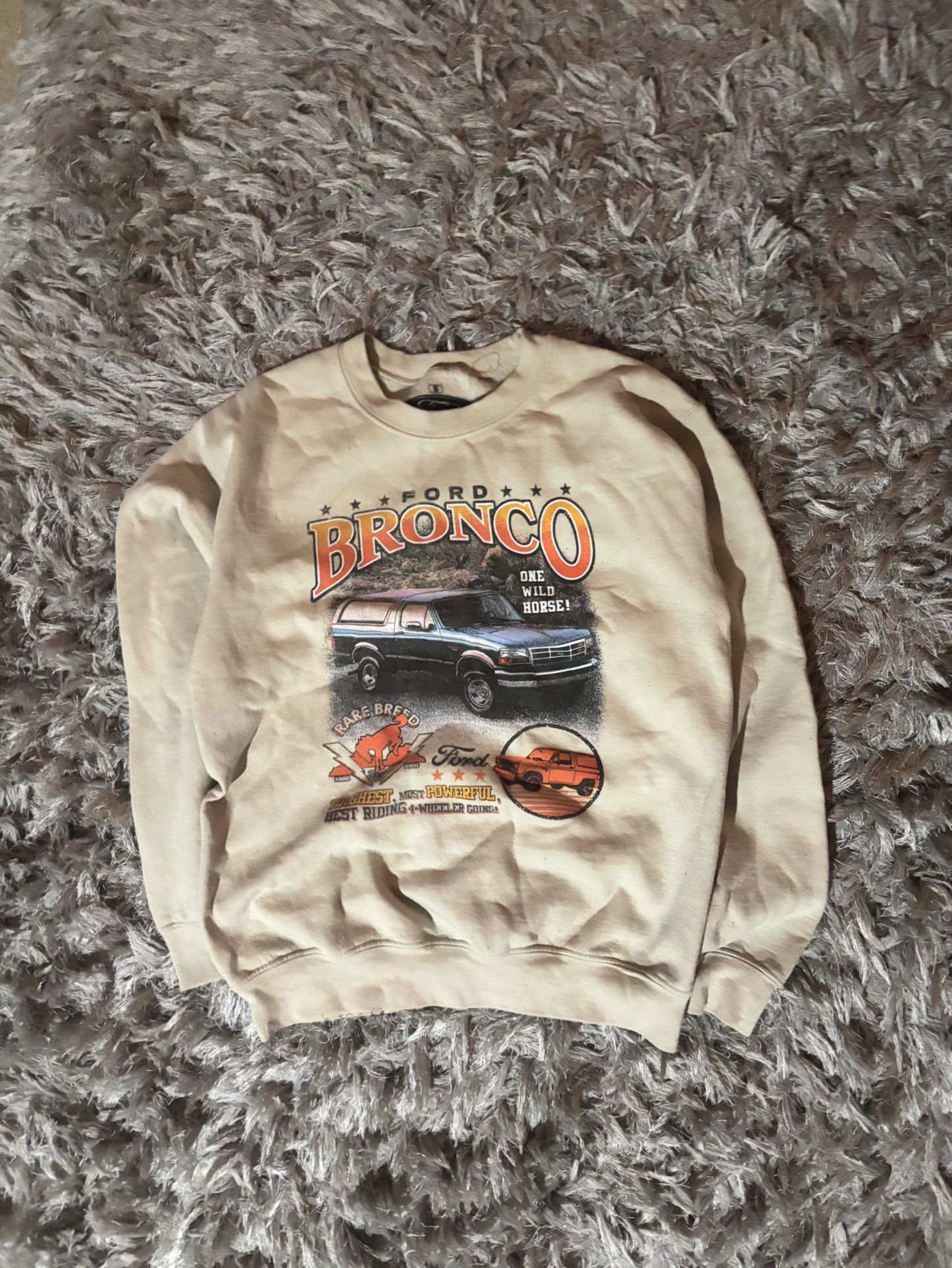 Ford Bronco sweatshirt in beige with classic logo graphic.