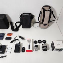 Lens, Cases, Batteries, Chargers, Remote Control, Shoulder Strap Belt

