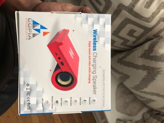 Wireless charger/ Bluetooth speaker