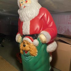Santa Claus with Dog Christmas Decoration