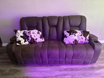Brown sofa and loveseat