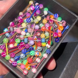 Tongue Rings Plastic $5