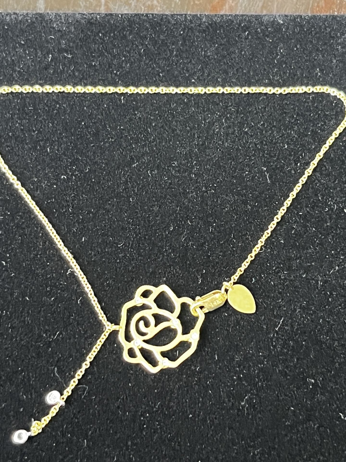14 karat solid, yellow gold link style anklet with hanging diamond pendant, and two diamond tassels