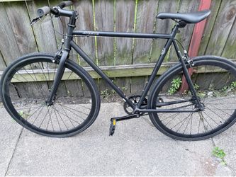 matte black Avasta single-speed fixed gear urban commuter bike.