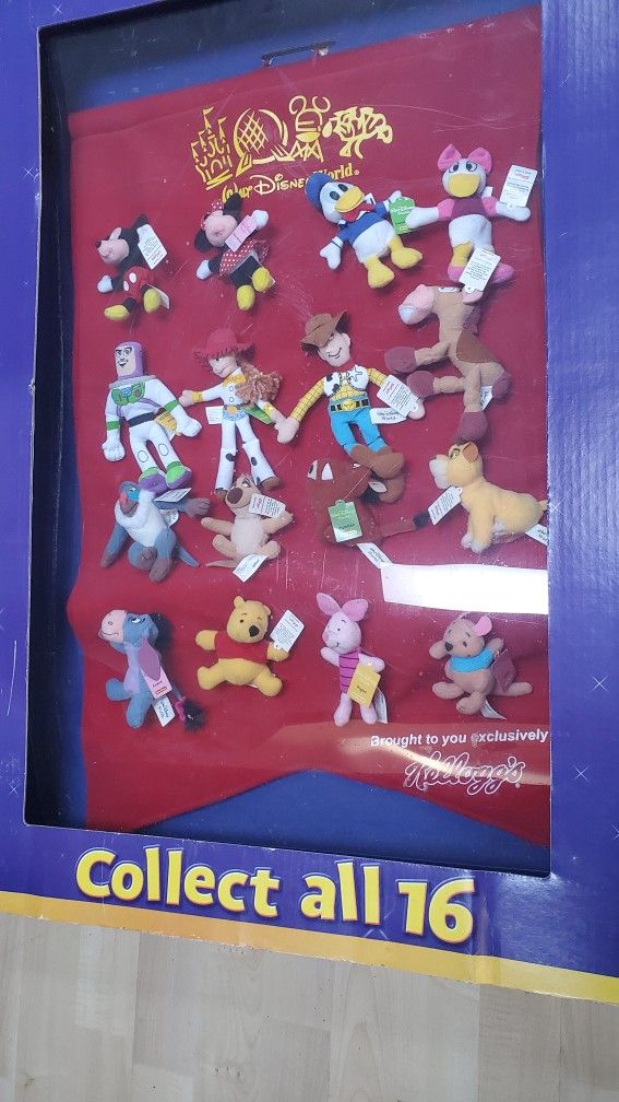 Kellogg's Walt Disney World set of 16 mini bean plush toys with a display wall banner.