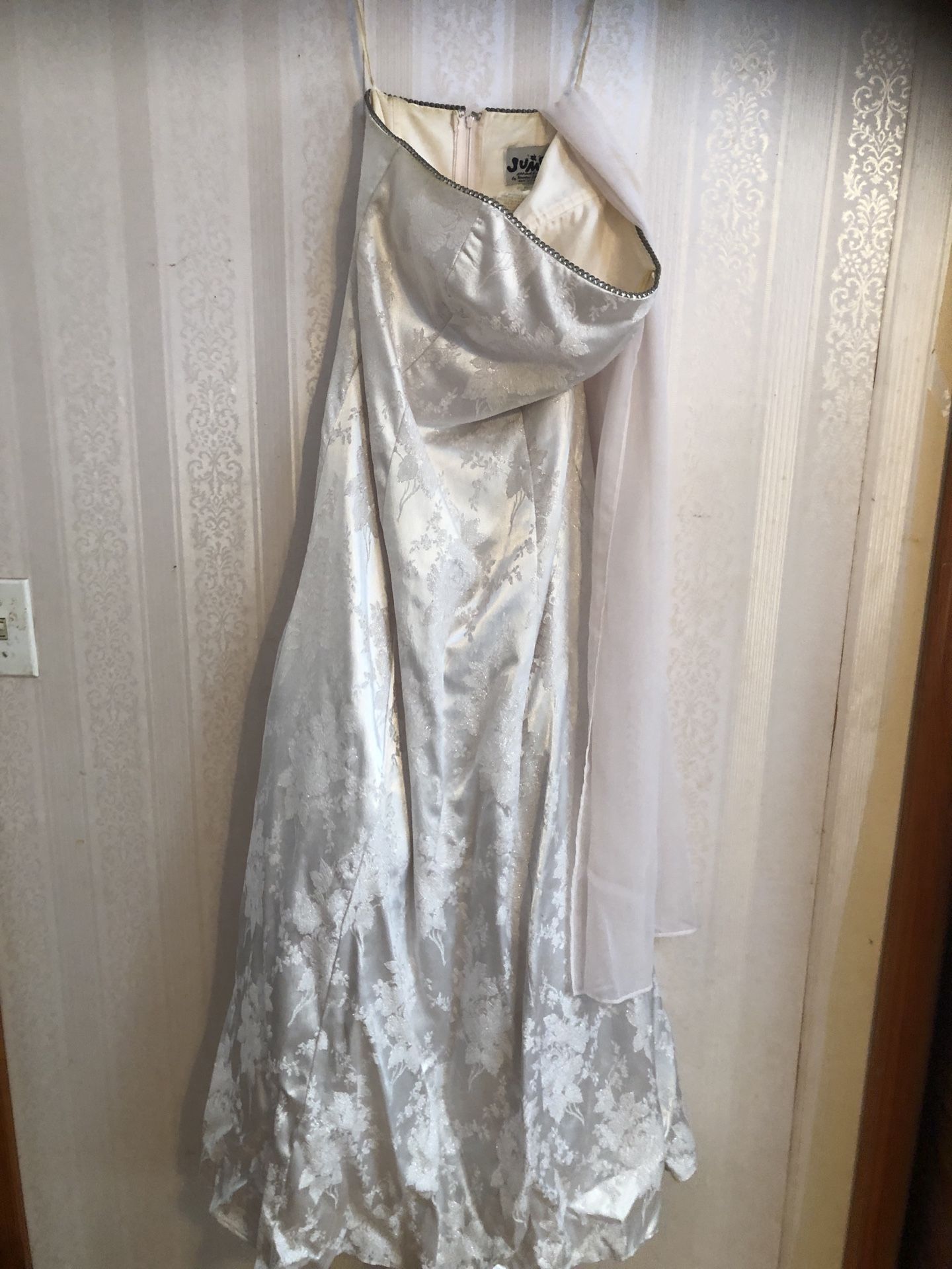 Wedding dress from 2003 size 5/6 used once preserved in plastic hundred dollars or best offer