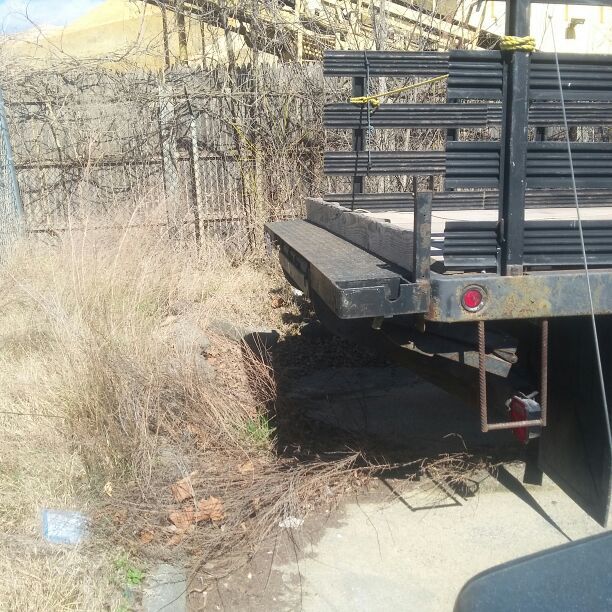 Stake body truck W/ lift gate