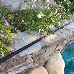 Awesome SEEKER Custom Wrapped Fishing Rod that has a BLACK to RED Swirl.